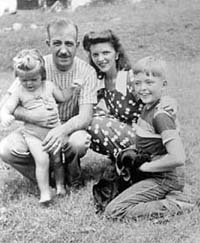With parents and sister
